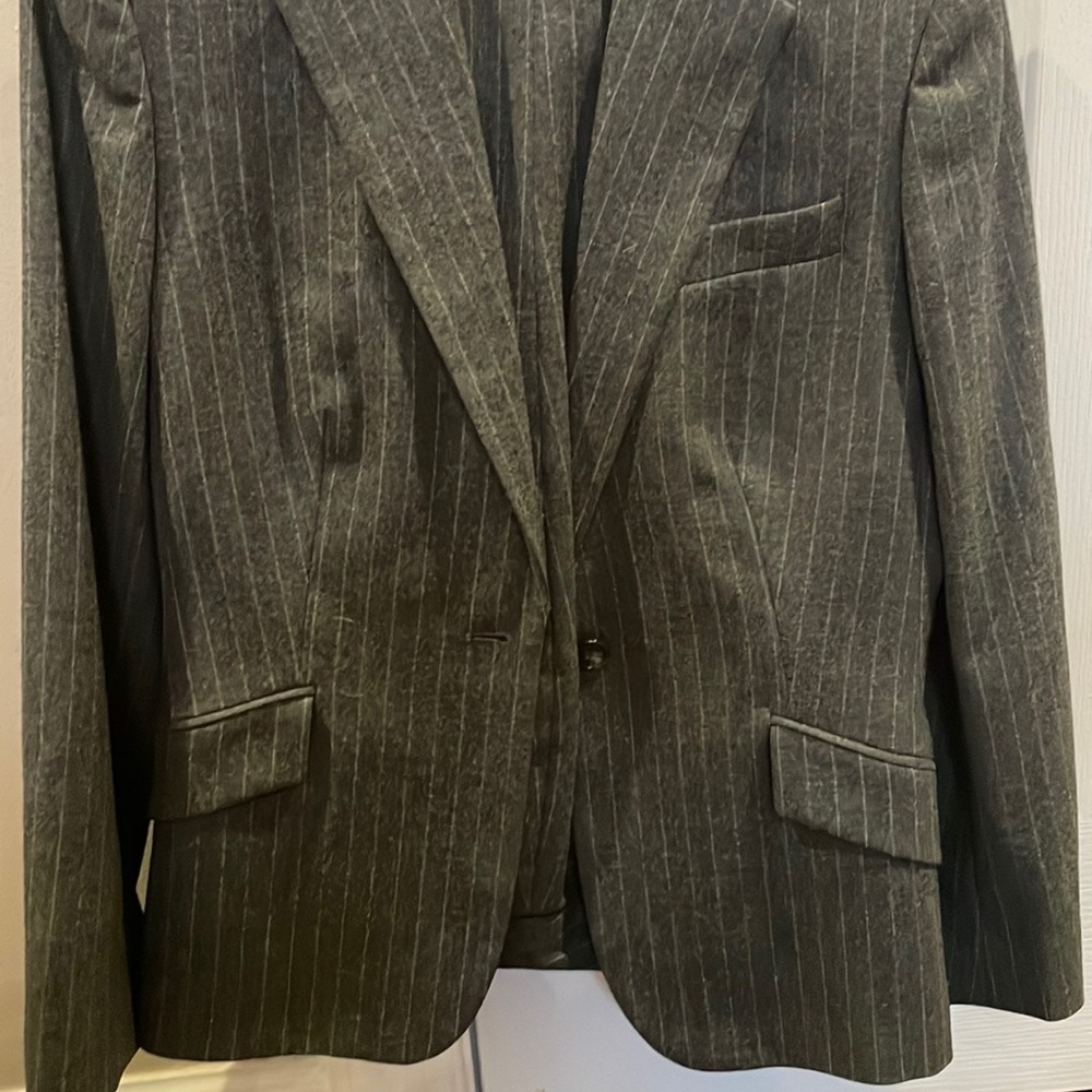 Brook Brothers suit. Classic pinstripe. Jacket is a 4 and pants are a size 2.
